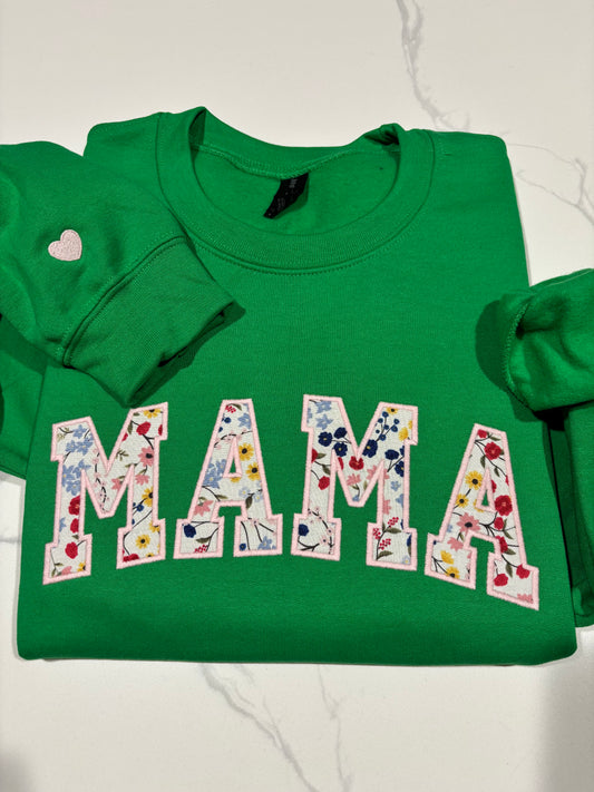 Mama Embroidered sweatshirt with floral fabric appliqué.